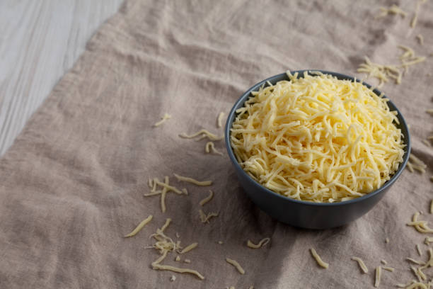 istock Shredded Mozzarella Cheese in a Bowl, side view. Copy space. 2162852741