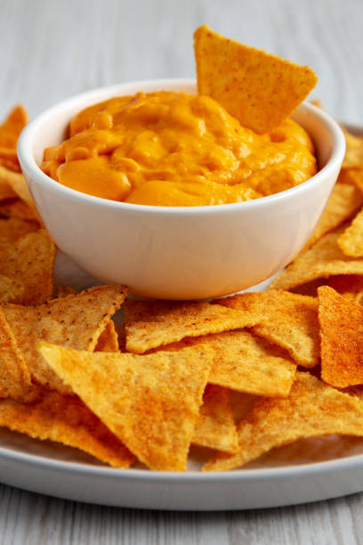 istock Cheese dip with tortilla chips, side view. Close-up. 2162853052