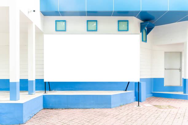 istock A blue and white building with a white wall and blue trim. 2162855671