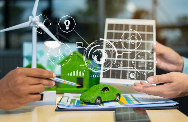 istock Two colleagues discussing data working and tablet, laptop with on Construction Site project, renewable and sustainable development, and solar panel concept. 2162856666