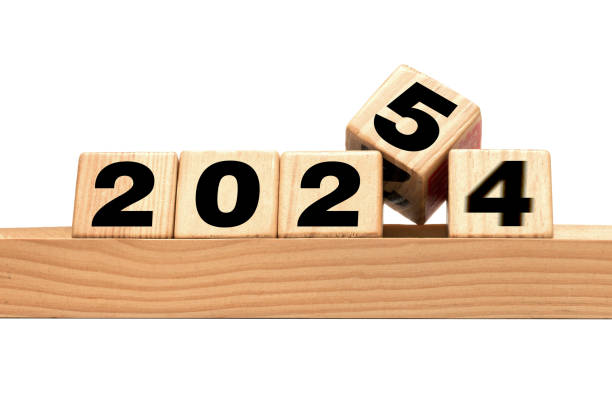 istock New Year 2025 with wood block isolated on white 2162856943