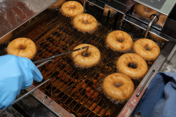 istock Doughnuts (donuts) making at a community fundraising event for a charity 2162857186