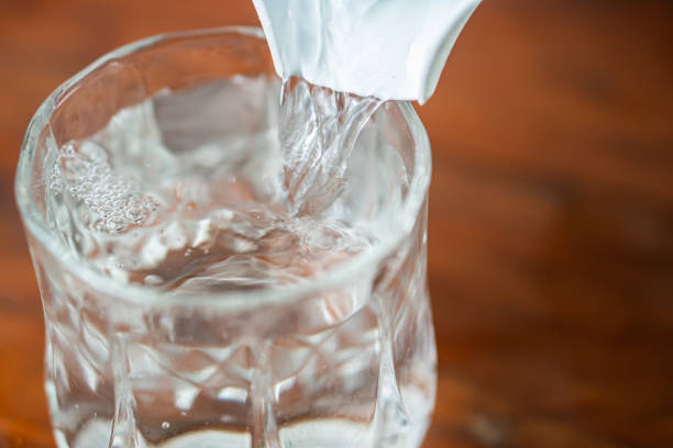 istock Pouring Water into a Glass 2162861251