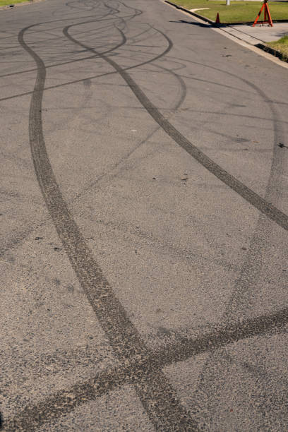 istock Burn out tyre marks on asphalt 2162866170