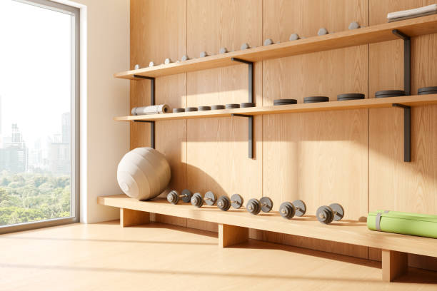 istock Wooden home gym interior with shelf for equipment, panoramic window 2162868976