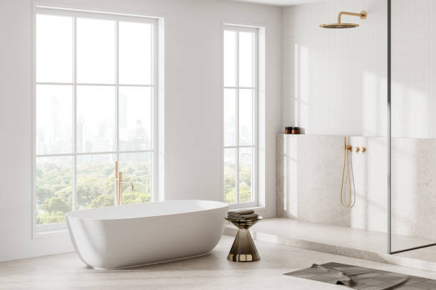istock Luxury home bathroom interior with tub and shower, panoramic window 2162870609