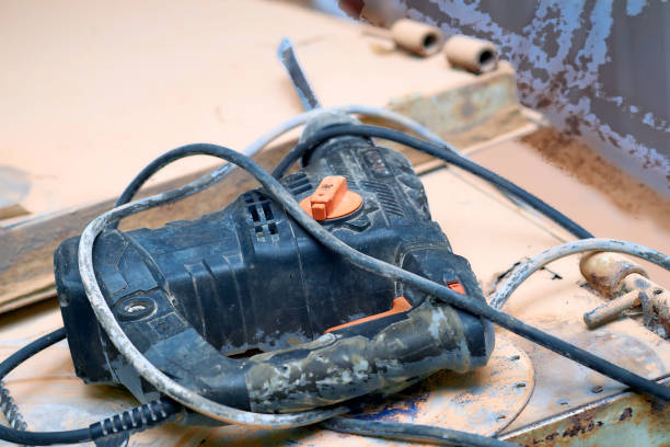istock Electric rotary hammer drill on metal surface.Construction 2162871933