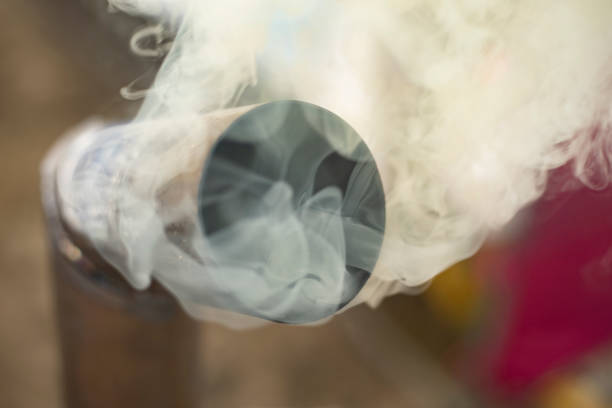 Smoke from the chimney. Steel pipe. Outdoor kitchen. The stove is smoking.