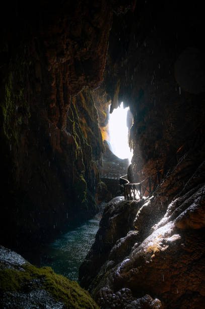 istock Inside the cave behind a waterfall in the Monasterio de Piedra, Spain. 2162876326