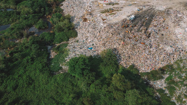 istock Garbage Vs Nature Stark Contrast. Mountains Of Trash Aerial. 2162878241