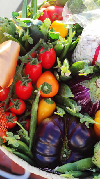 istock raw vegetables basket with artichokes 2162879225