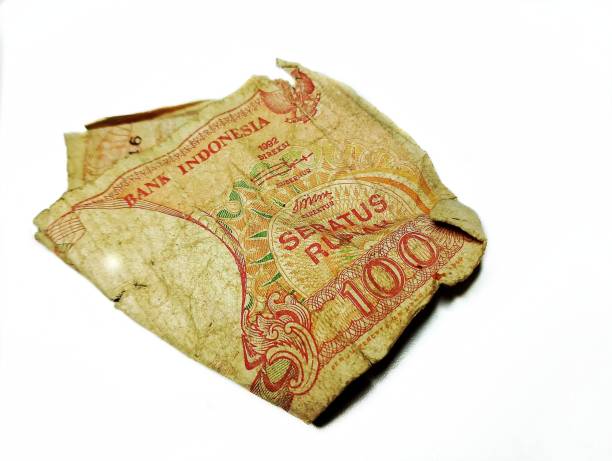 istock 100 Rupiah (Indonesian currency) from old Indonesian money from 1992 which is outdated 2162879502