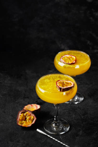 istock Cocktail spritz with passion fruit on black background 2162879815