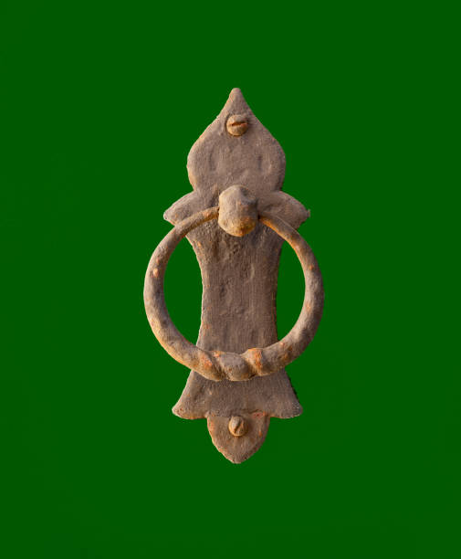Ancient door knocker dating back to the 19th century. Copyspace around..
