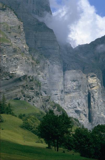 Italy, 1977. The rock wall of the Dolomites in the Eastern Alps.