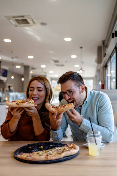 istock Pizza sharing moment in couple's day 2162884205