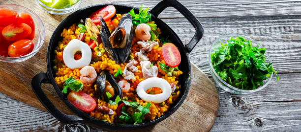 istock Seafood paella served in a cast iron pan 2162884336