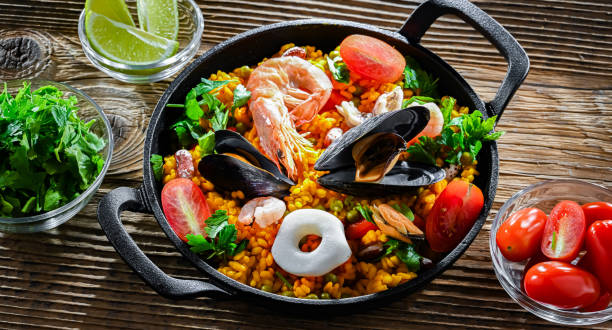 istock Seafood paella served in a cast iron pan 2162884388