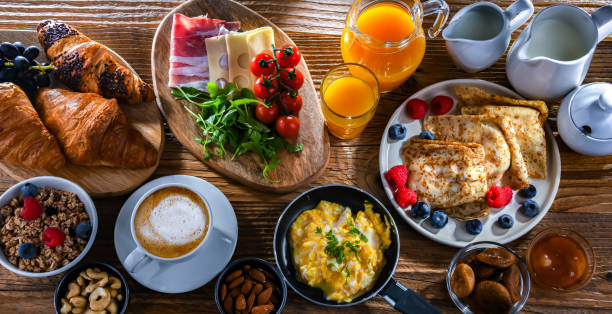 istock Breakfast served with coffee, eggs, cereals nd croissants 2162884678