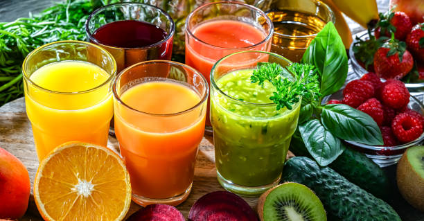 istock Glasses with fresh organic vegetable and fruit juices 2162884761