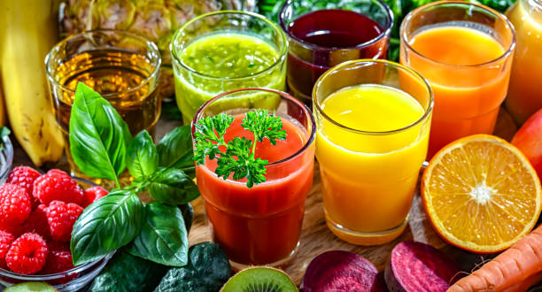 istock Glasses with fresh organic vegetable and fruit juices 2162885274