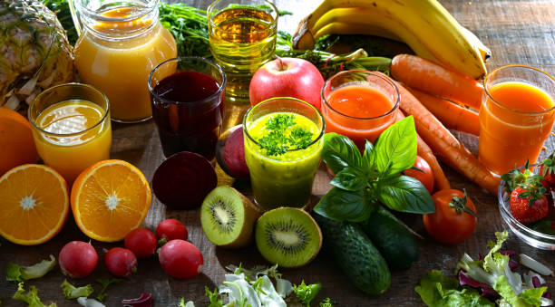 istock Glasses with fresh organic vegetable and fruit juices 2162885310