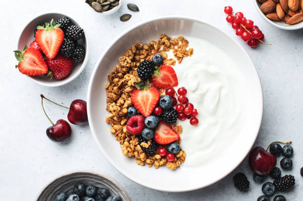 istock Baked granola with yogurt and fresh berries 2162885443