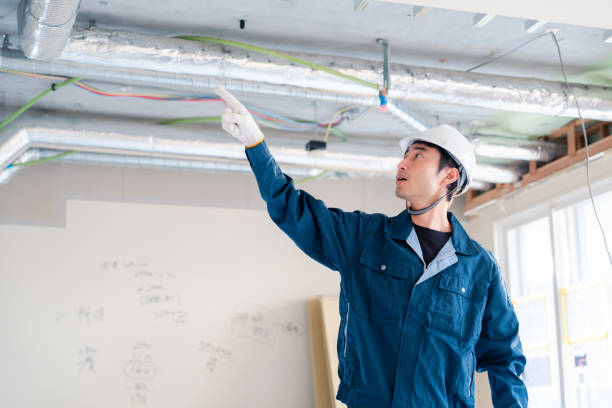 istock Male construction worker pointing and checking for safety. 2162892246