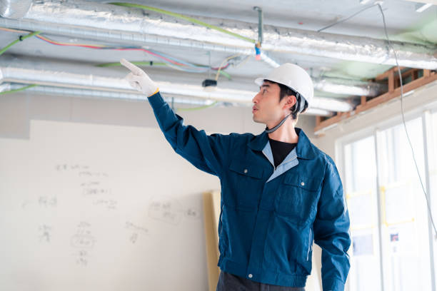 istock Male construction worker pointing and checking for safety. 2162892250