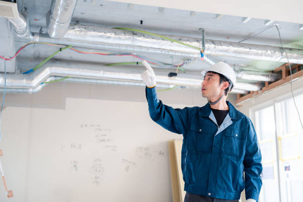 istock Male construction worker pointing and checking for safety. 2162892256