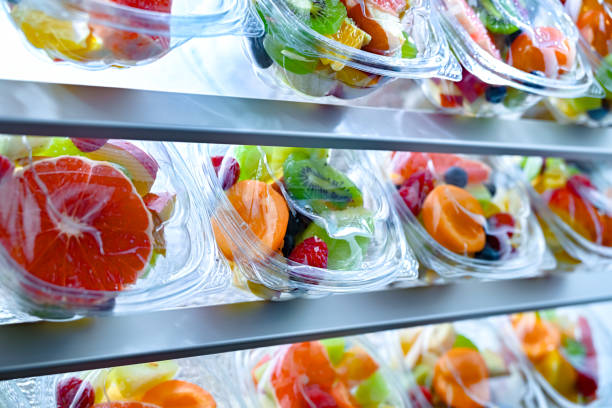 istock Boxes with pre-packaged fruit salads in a commercial fridge 2162895038