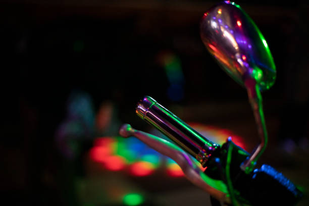 Chrome motorcycle part. Motorcycle at the disco. Chrome handle. Bright object.