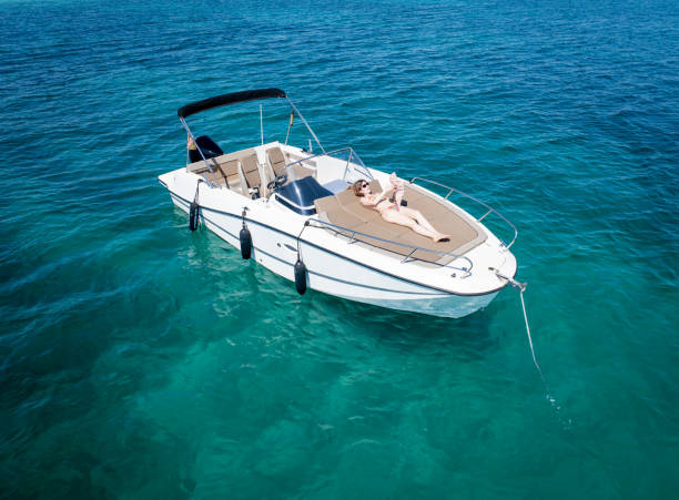 istock Girl and boat 2162896388