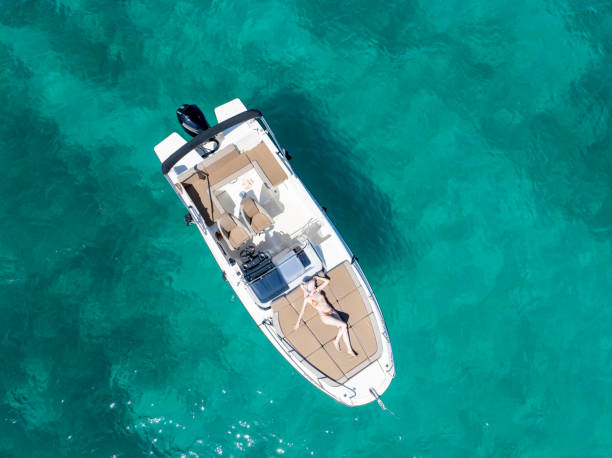 istock Girl and boat 2162896406