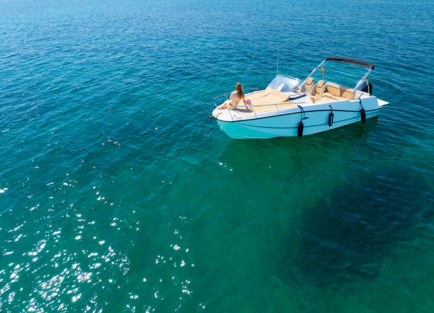 istock Girl and boat 2162896482