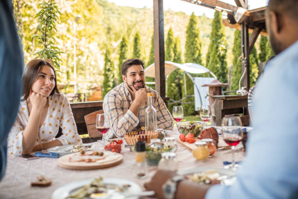 istock A group of friends chatting during lunch 2162896774