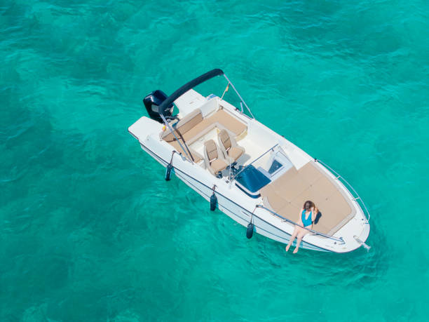 istock Girl and boat 2162897136