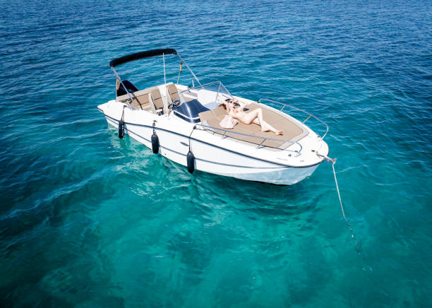 istock Girl and boat 2162900036