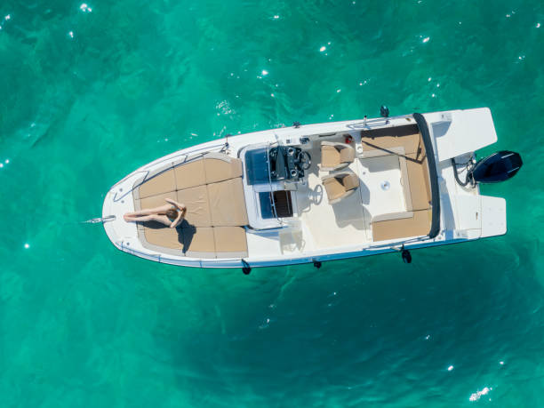 istock Girl and boat 2162900103
