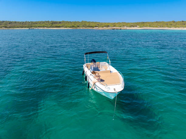 istock Girl and boat 2162900292