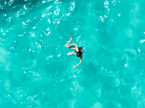 istock GIrl swimming 2162900363