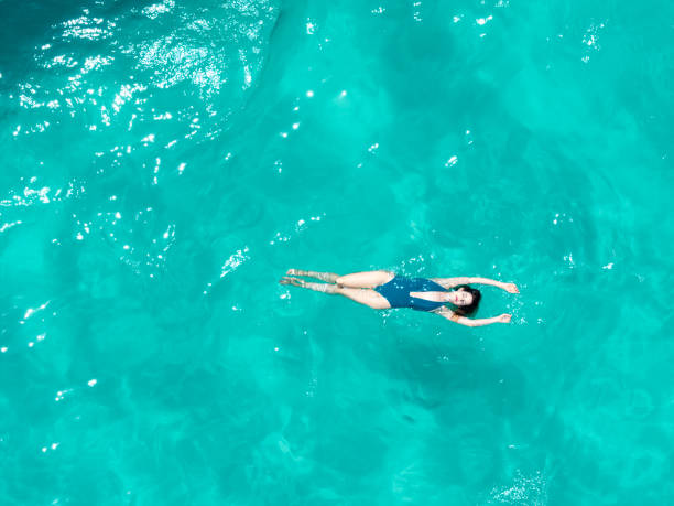 istock GIrl swimming 2162900402