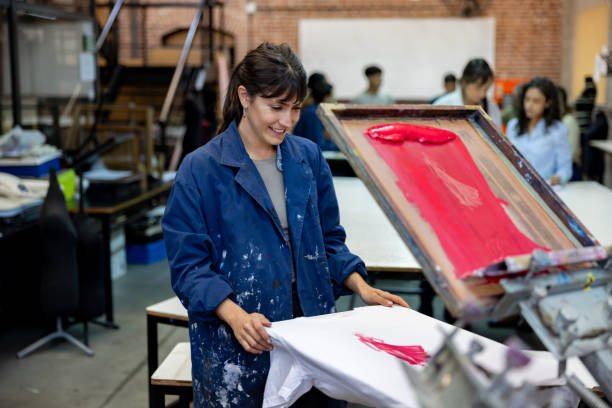 istock Student printing a beautiful design on a textile in a fashion class 2162903083