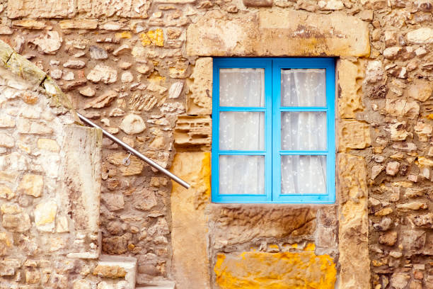 A view of a staircase in an alley of the medieval city of Gubbio, in Umbria, Italy