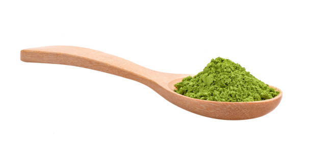 istock matcha green tea powder in wood spoon on white background 2162908306