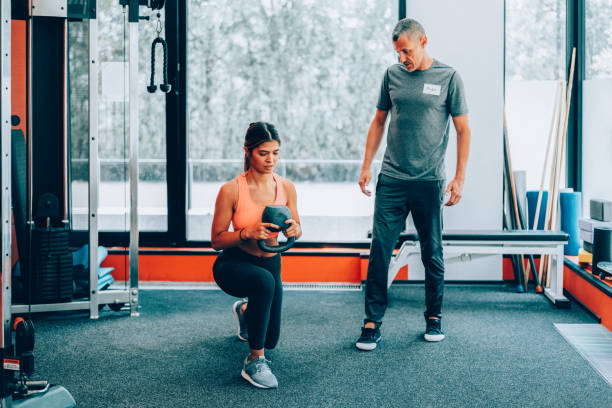 istock Sports training with personal trainer 2162909276