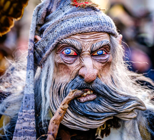 Munich, Germany - December 10: participants of the traditional Krampuslauf with costumes and wooden masks at the old town of Munich on December 10, 2023