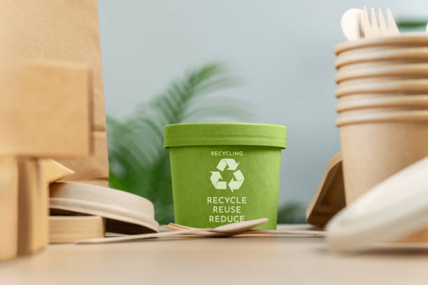 istock Reduce, reuse, recycle symbol. ecological concept Ecological metaphors for ecological waste management and sustainable lifestyles. Recycle symbol attached to a green cardboard jar. 2162915830