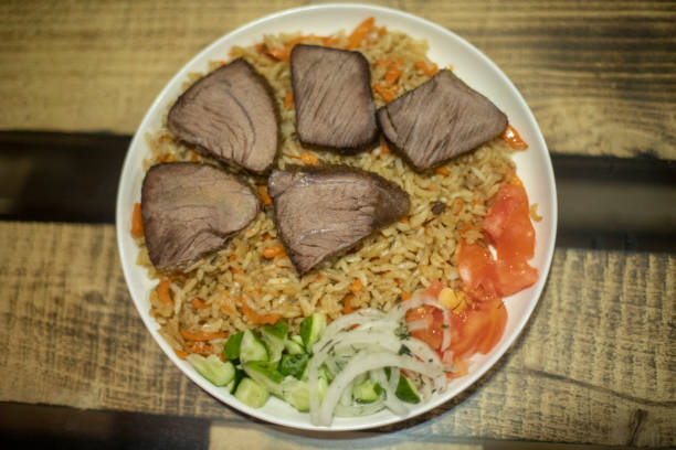 istock Food in white plate on table. Delicious dish. Hot dinner. 2162926402