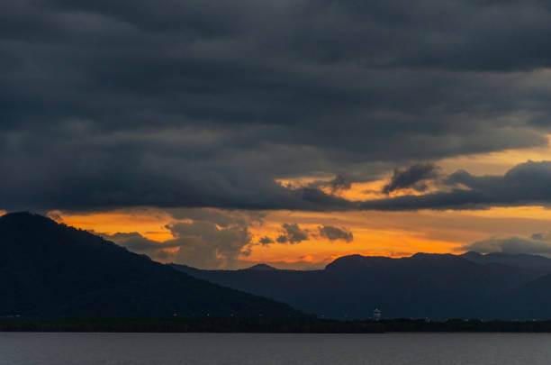 Dramatic clouds during sunset over Cairns. Cairns is major tourist destination with access to Daintree Rainforest and Great Barrier Reef.